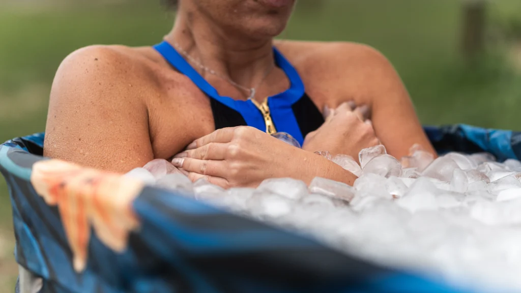 someone using an ice bath for recovery